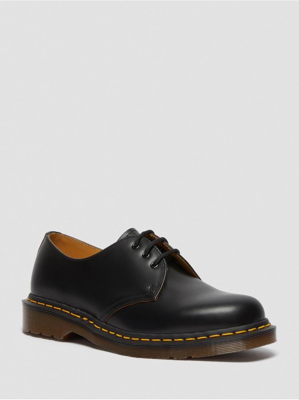 Dr. Martens 1461 black smooth leather Oxford shoes with iconic yellow stitching.